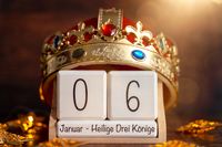 Heiligen Drei Könige – Kalender zeigt 6. Januar mit goldener Krone und festlicher Dekoration.