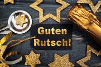 Guten Rutsch Spruch zum neuen Jahr mit goldenen Sternen und Champagnerflasche.