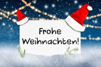 Frohe Weihnachten steht auf einem Schild