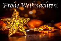 Goldener, leuchtender Weihnachtsstern mit 'Frohe Weihnachten' Text vor verschwommenen Lichtern.